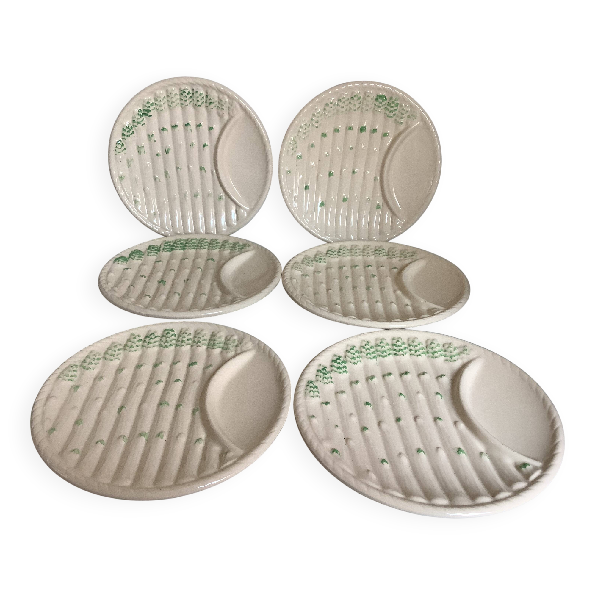 Six antique asparagus plates