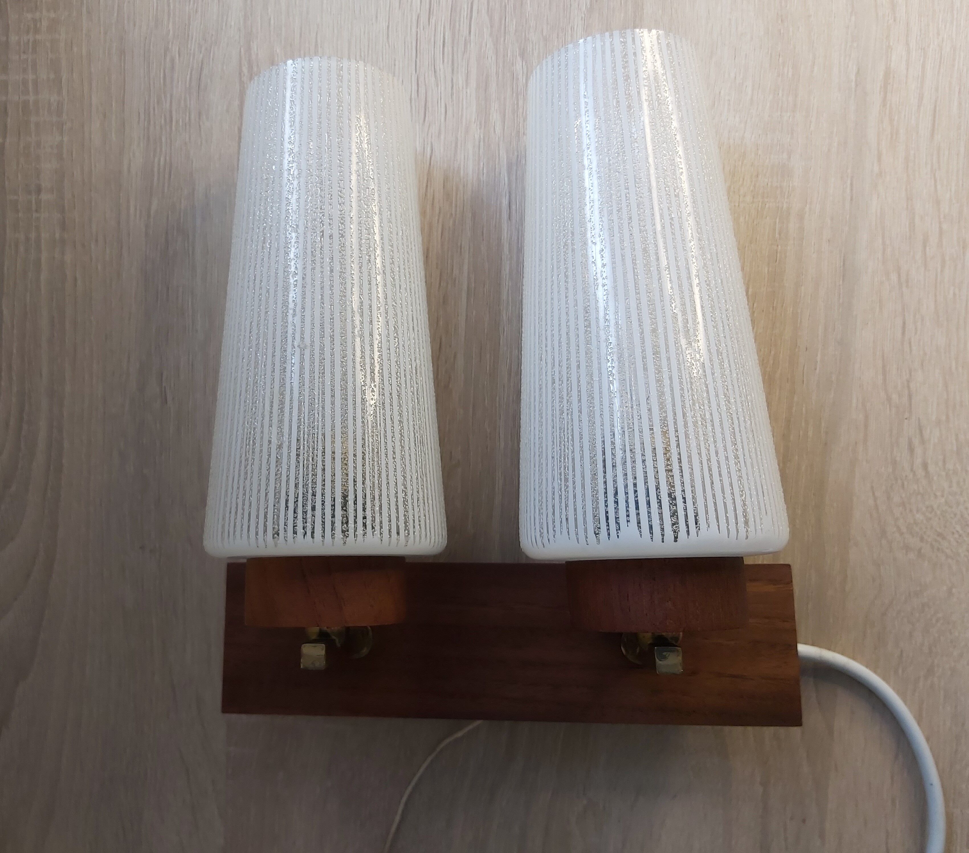 Wall lamp in teak wood and glass