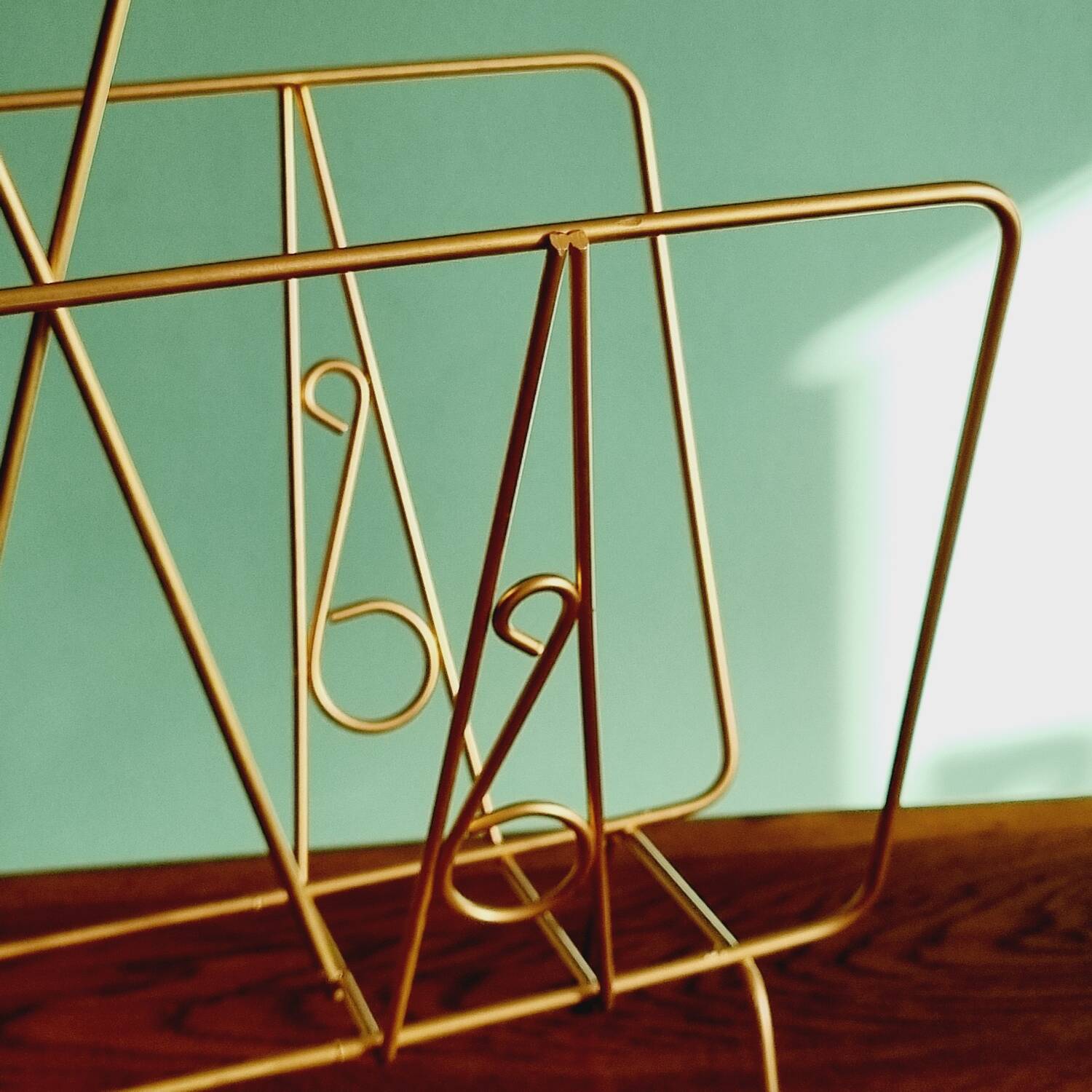 Golden metal magazine holder