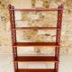 Vintage 5-tier turned wood shelf on legs.