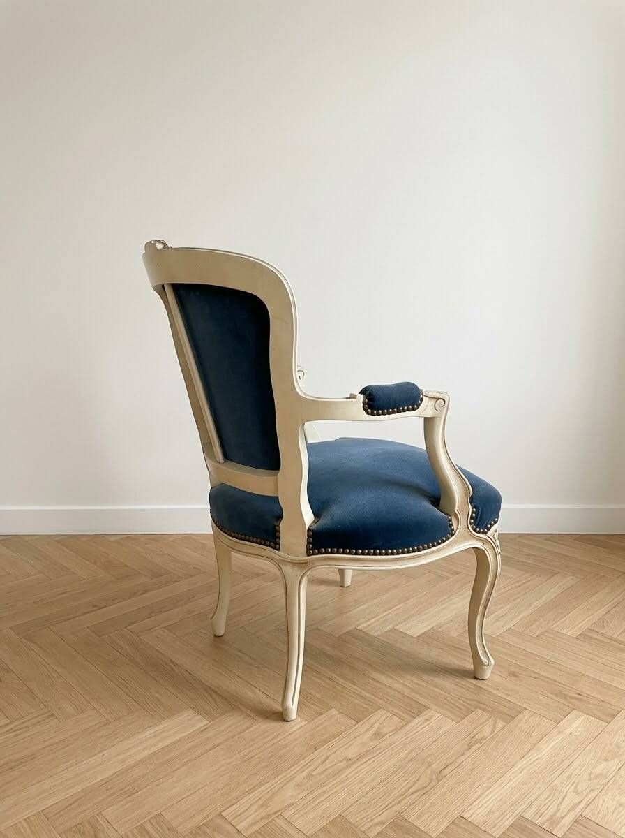 Louis XV cabriolet armchair in blue velvet and patinated wood