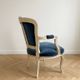 Louis XV cabriolet armchair in blue velvet and patinated wood