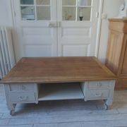 Coffee table on casters, made from an old desk, pearl gray base and belt.