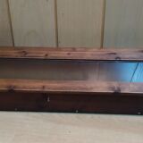 Former wooden display case
