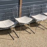 4 chrome Bertoia chairs with cushion