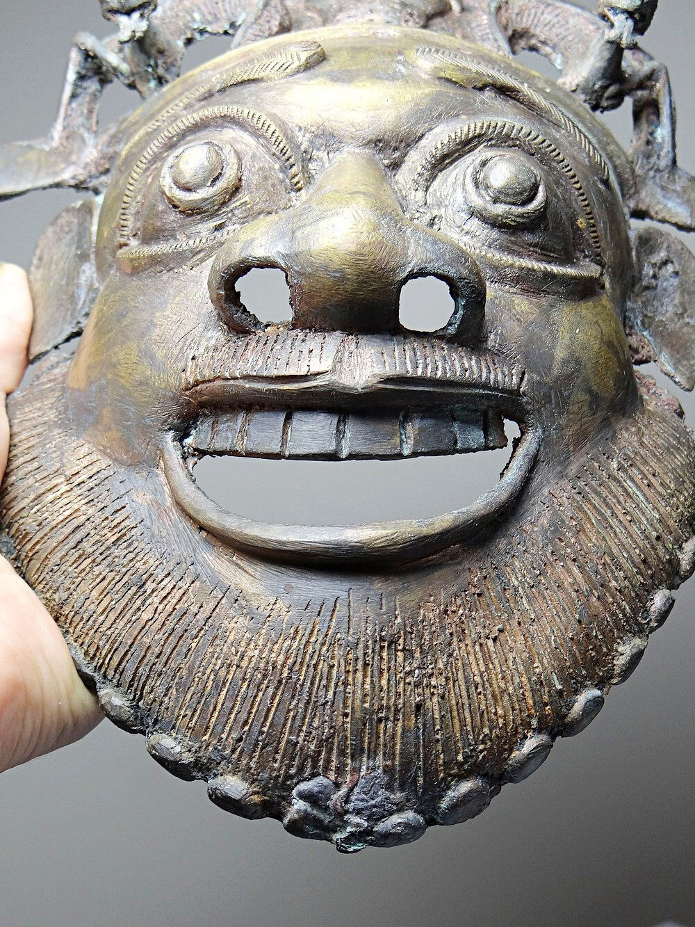 Vintage bronze African mask from Bamoun, Cameroon.