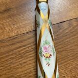 Ladle with earthenware reed