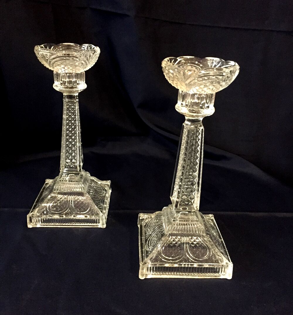 Pair of molded glass candle holders