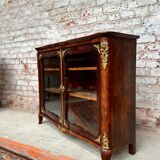 Low showcase in rosewood veneer of the regency xviii th century