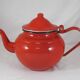 Vintage teapot coffee maker in red enameled metal