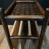 Vintage rattan magazine rack on wheels