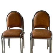 Set of 4 vintage tubular chrome chairs