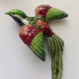 Two exotic birds in slip to hang