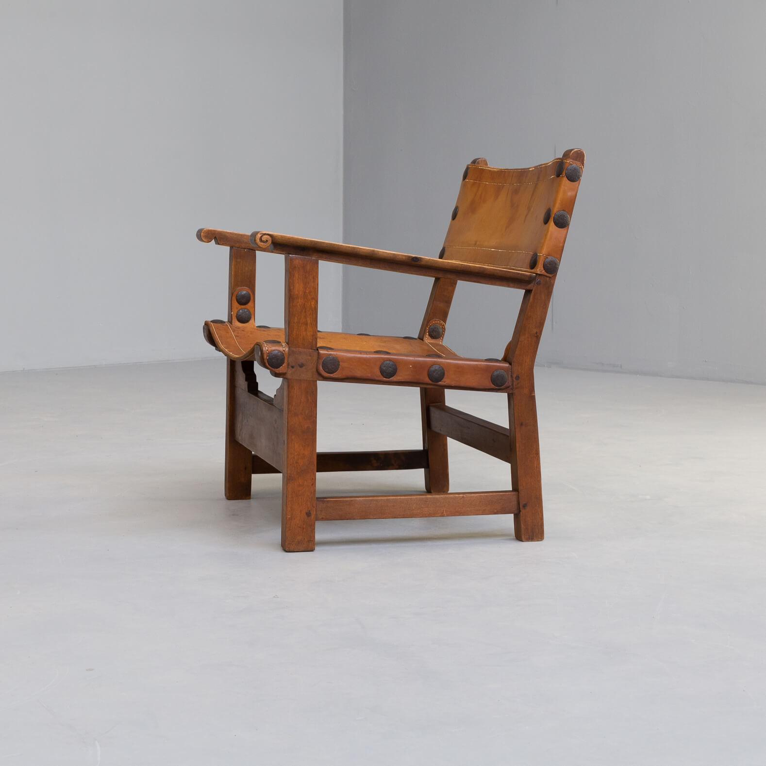 50s oak brutalist spanish chair with saddle leather