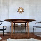 Large Scandinavian round table with 2 extensions, entirely made of teak