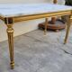 Table basse style Louis XVI en marbre et bois doré