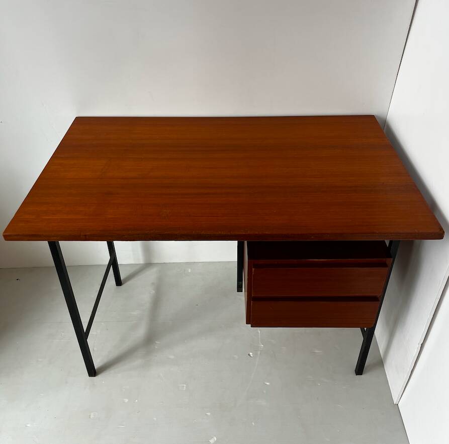 Vintage wooden and metal desk in modernist style.