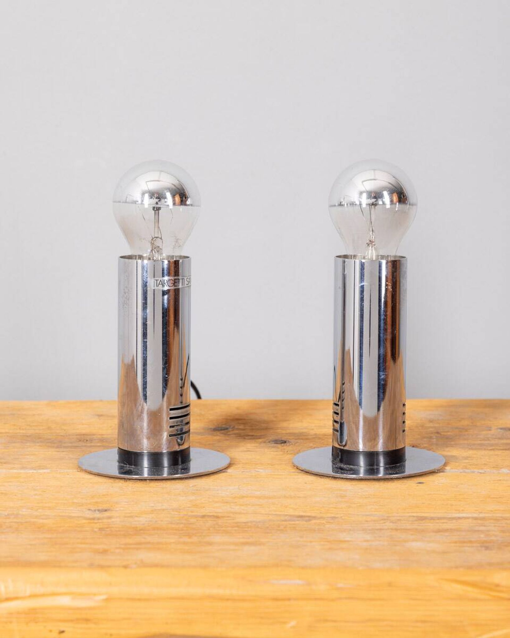 Pair of vintage 70s table lamps in chromed steel design targetti
