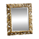Mirror, late 19th century, carved wood, gilded stucco.