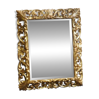 Superb mirror from the late 19th century, carved wood with gilded stucco.