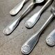 6 large Christofle silver-plated spoons with shell decoration.