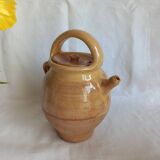 Jug, small terracotta pitcher with yellow glaze