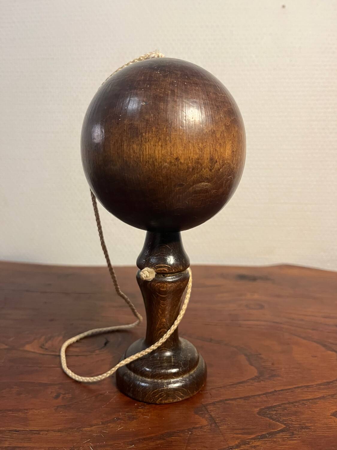 Wooden cup and ball game from the 60s