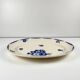 Oval half-porcelain plate from Badonviller, blue flower pattern, early 20th century.
