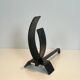 Pair of modernist andirons in steel and wrought iron