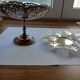 Two metal cups with an openwork design.