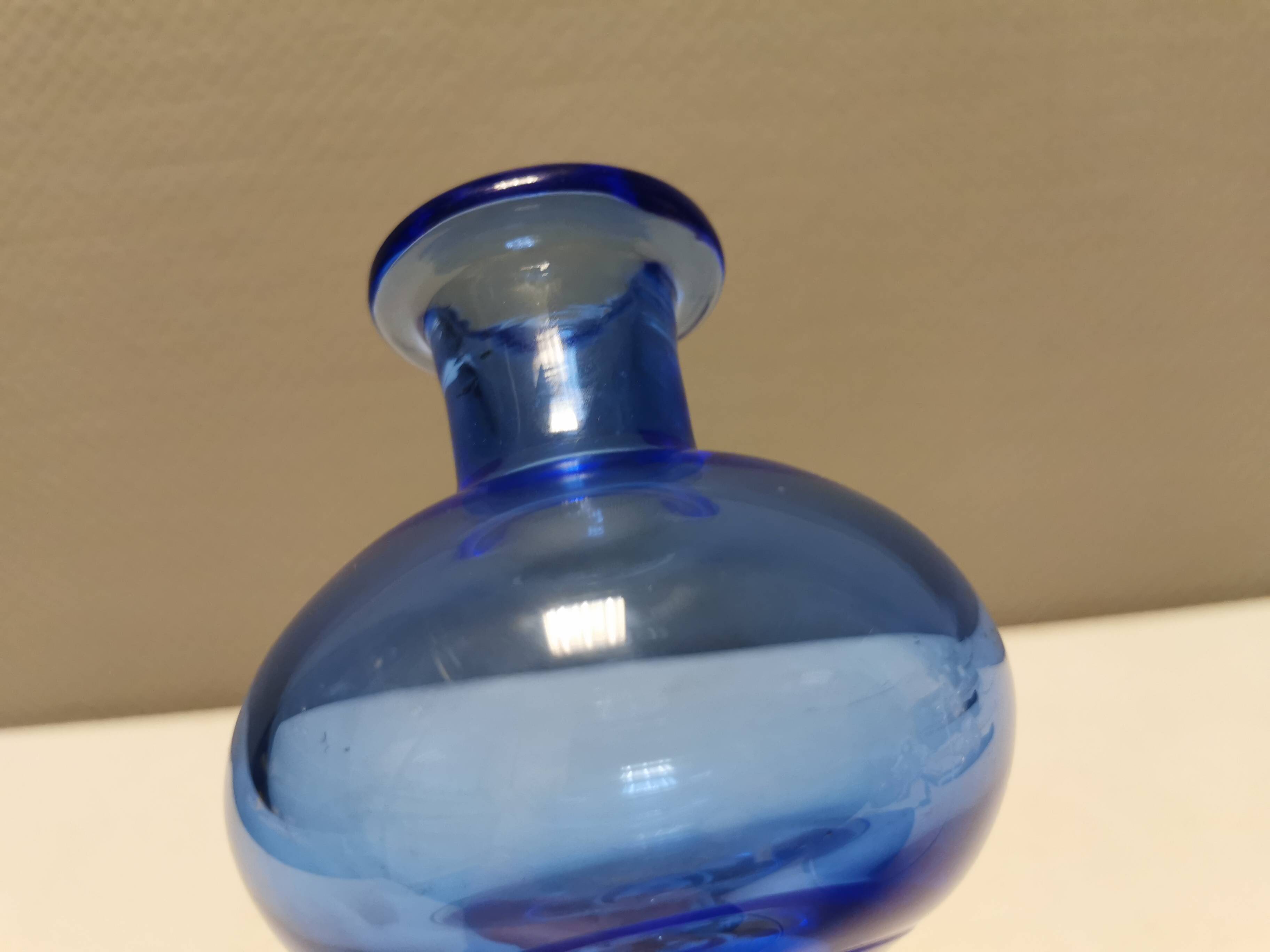 Vase with trumpet-shaped foot, in translucent and blue glass, model Lagune, 1974.