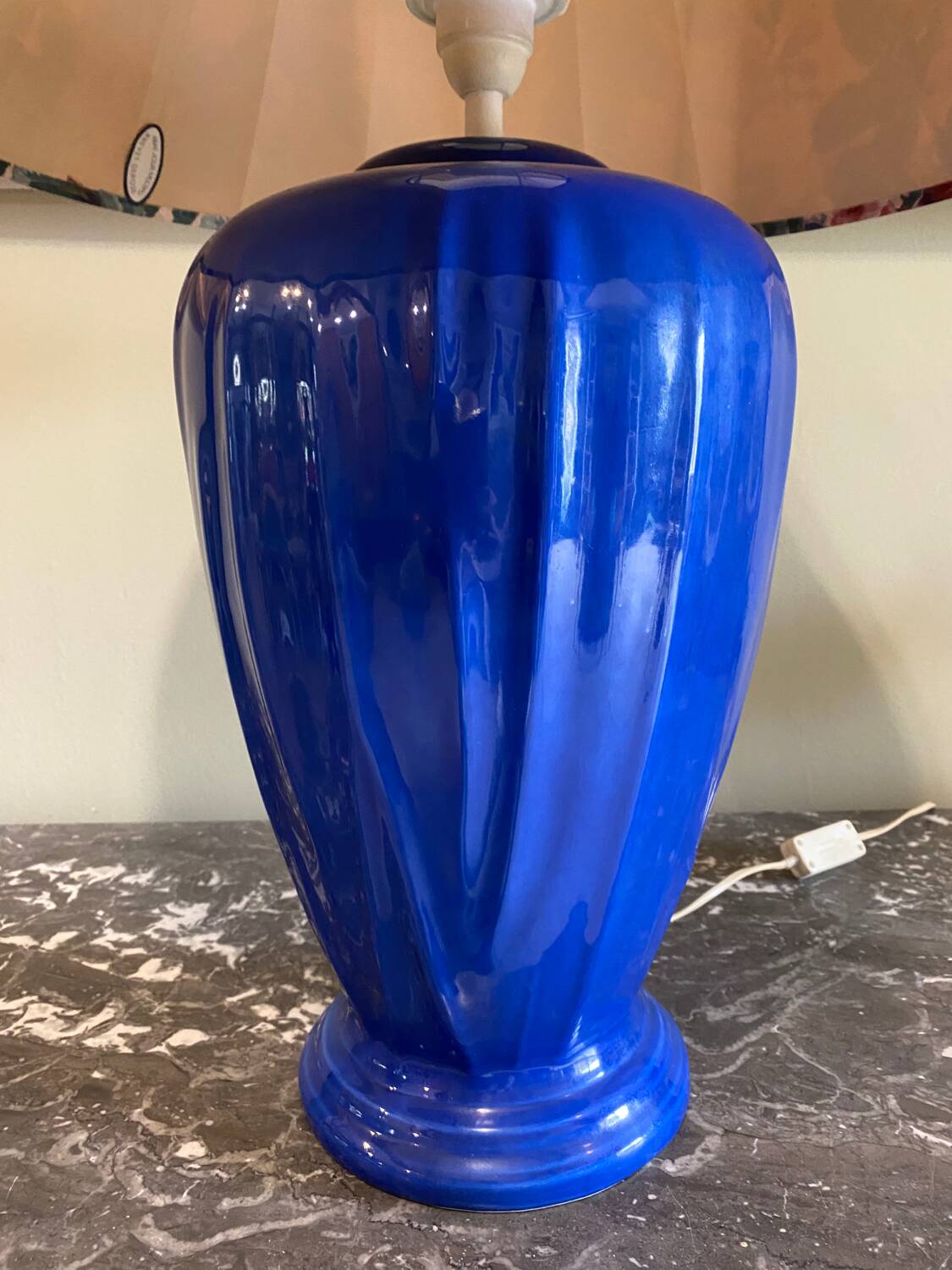 Large blue ceramic lamp with floral shade