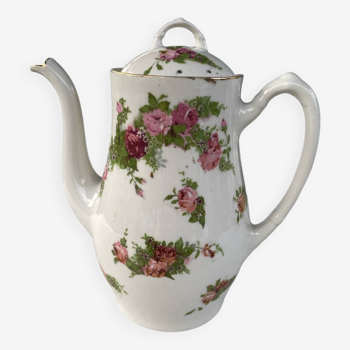 Porcelain teapot with flowers