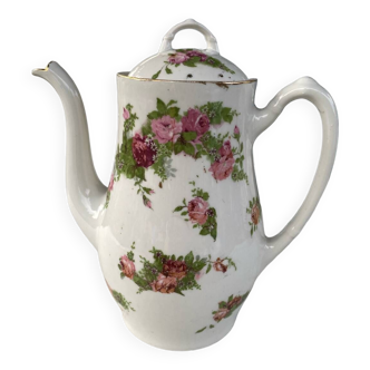 Porcelain teapot with flowers