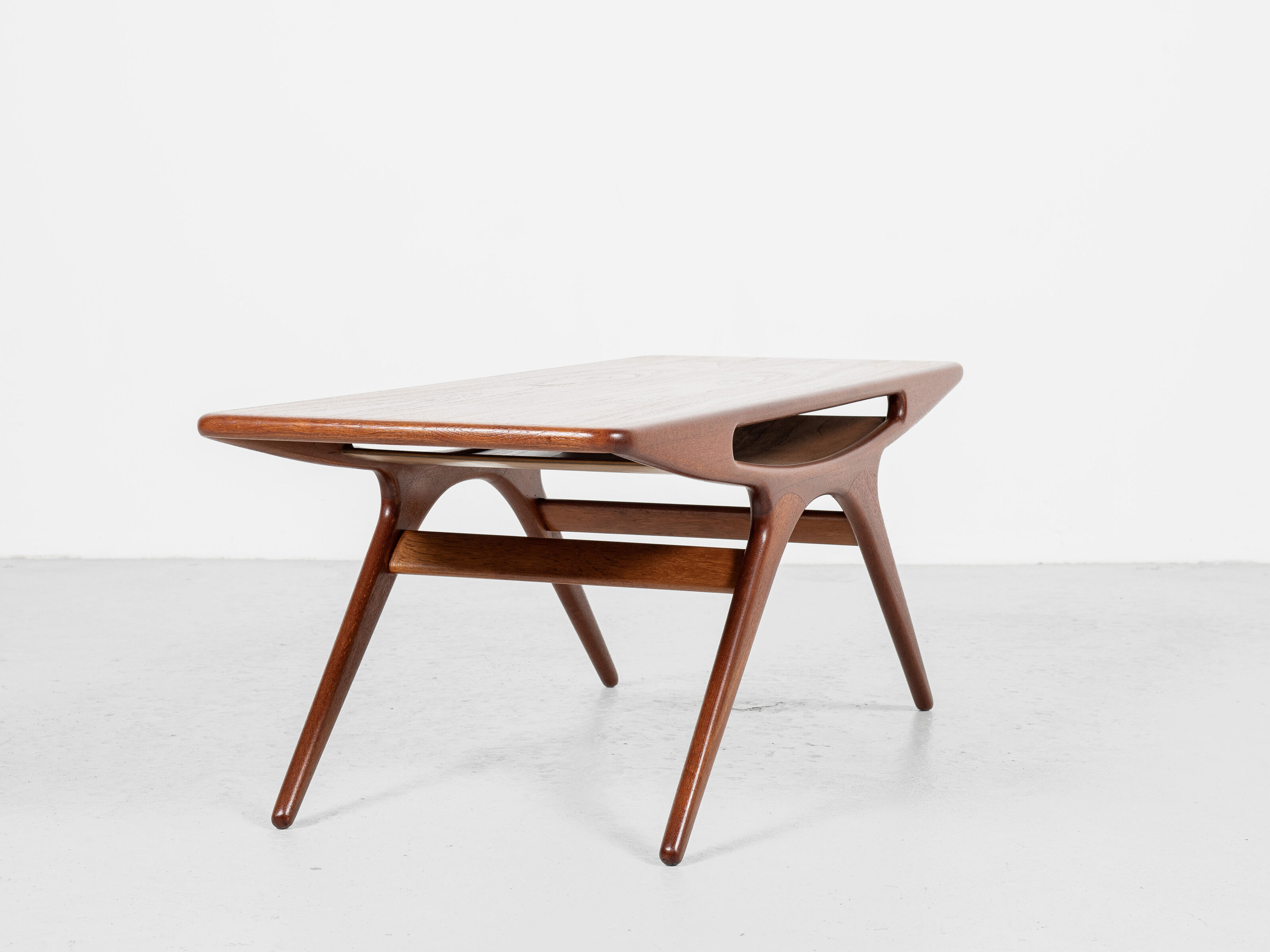 Midcentury danish smile coffee table in teak by johannes andersen for silkeborg 1950s