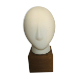 Ceramic head on wooden base