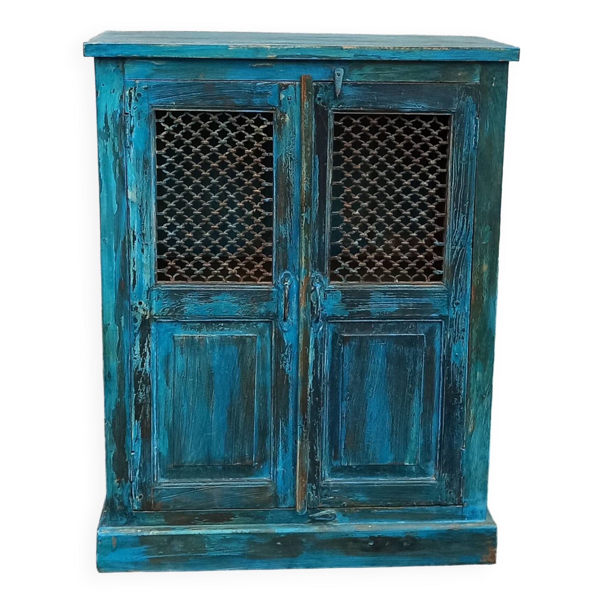 Old wooden cabinet with doors with grille