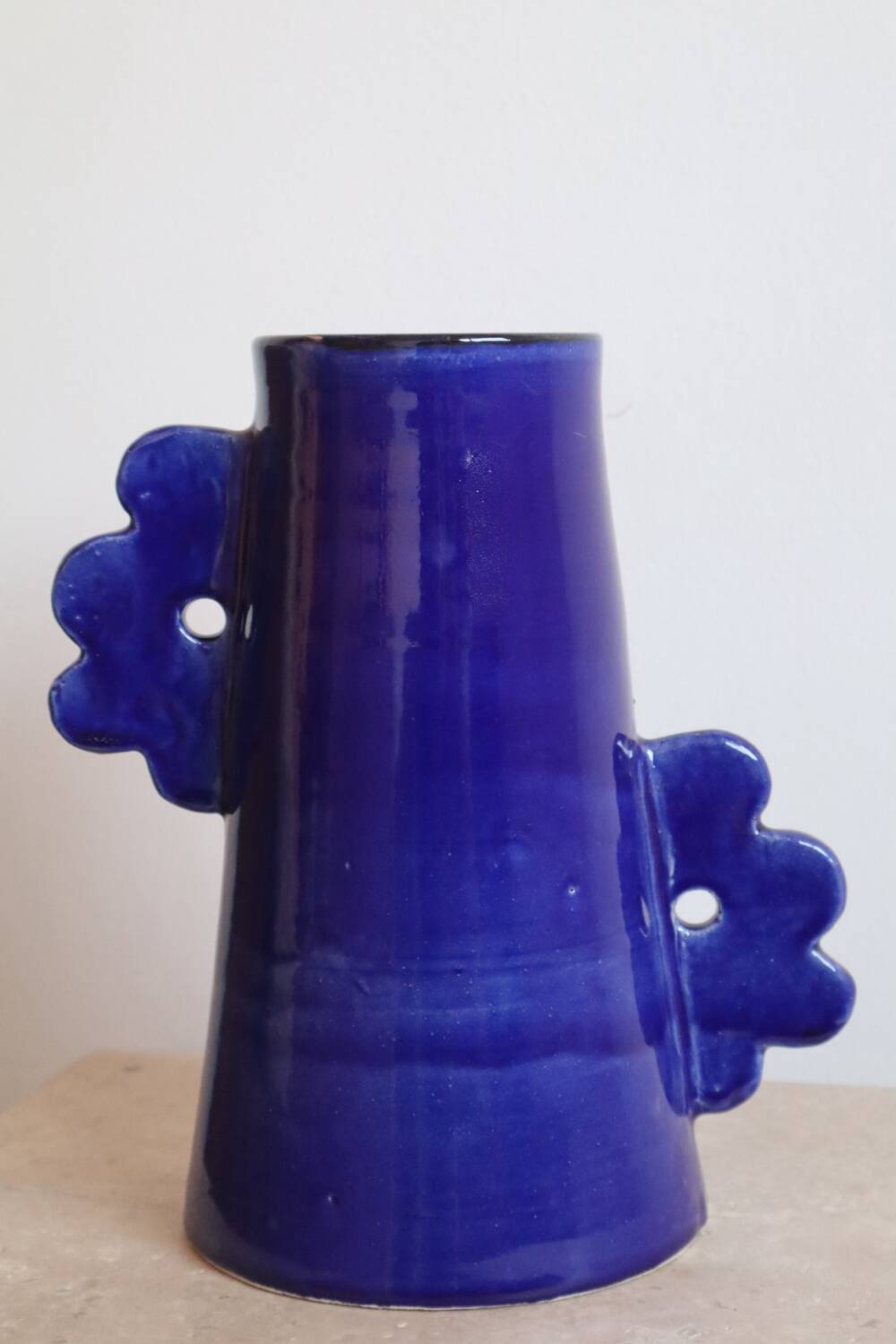 Handmade abstract ceramic vase with asymmetrical floral handles in midnight blue