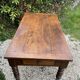 Old kitchen table with chopping board