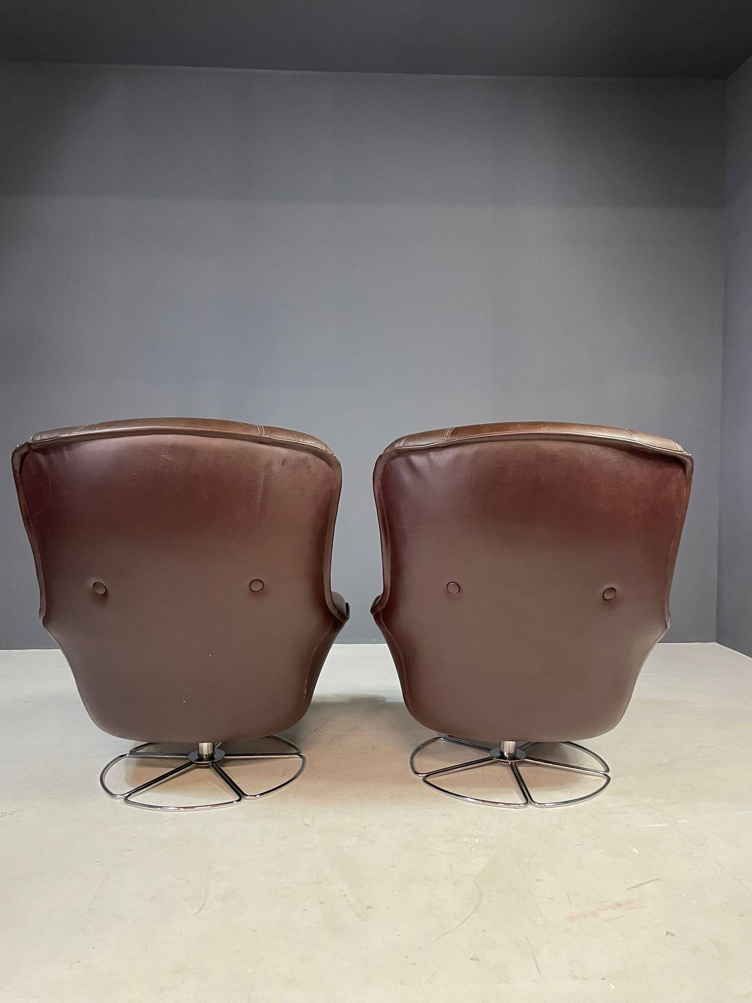 Pair of leather swivel armchairs by PEEM, Finland, 1970s