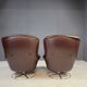 Pair of leather swivel armchairs by PEEM, Finland, 1970s