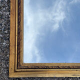 Golden trumeau mirror in Louis XVI style, 20th century.