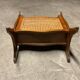 Vintage wicker newspaper rack