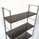 Patinated metal wall shelf
