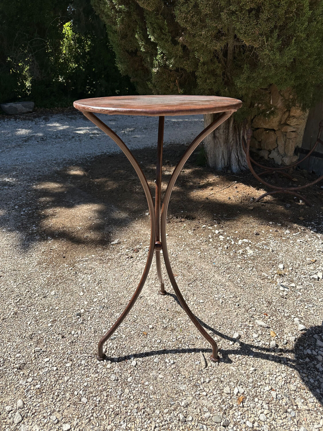 Artisanal wrought iron side table