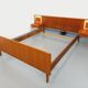 Vintage Scandinavian style double bed in teak from the 60s with integrated bedside lights