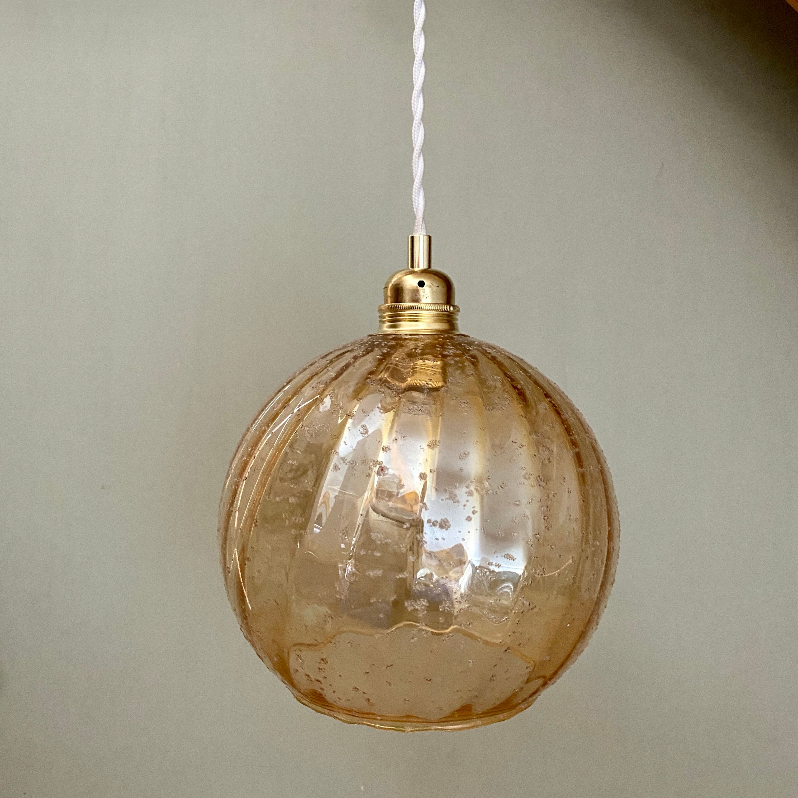 Vintage globe pendant lamp in amber glass