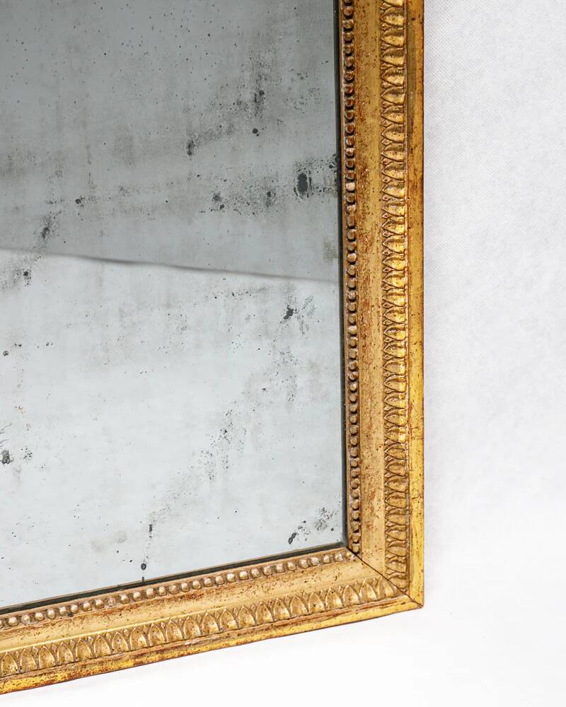 Miroir rectangulaire de style Louis XVI avec verre renardé