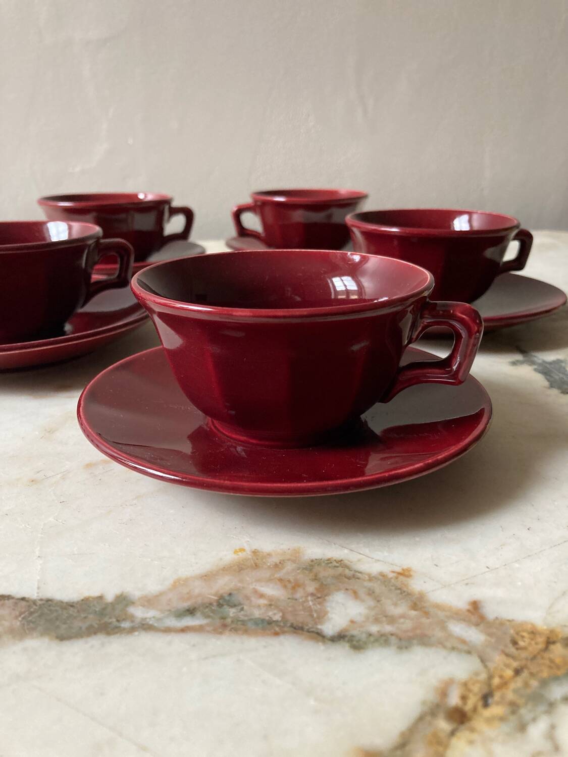Burgundy cup and saucer