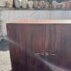 Asymmetrical antique Art Deco sideboard in rosewood veneer.